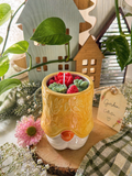 Yellow gnome candle